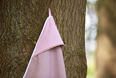 Handdoek met capuchon effen roze wafelpiqué roze